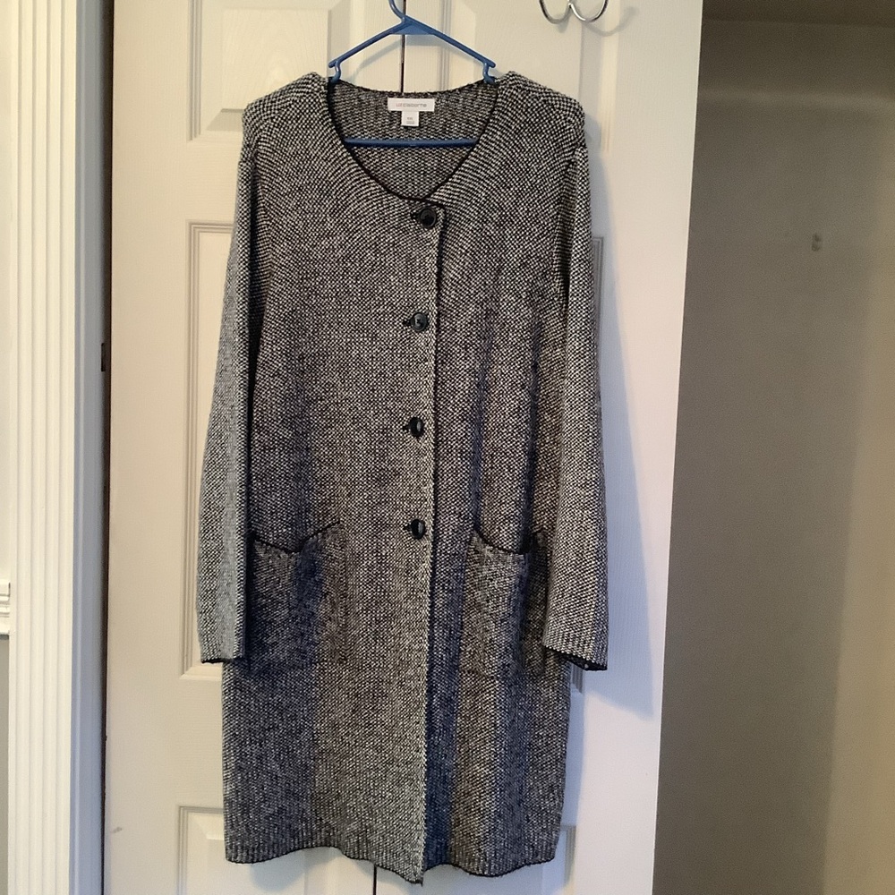 Long sweater coat never worn. In excellent condition.